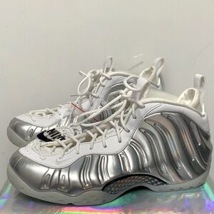 Nike Air Foamposite shoes. NEVER WORN. White with holographic sides.